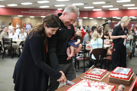 Dub and Susie Oliver, president and first lady of the university, cut the cake during the celebration of their 5 years at Union University. - Photo by Kristi McMurry Woody