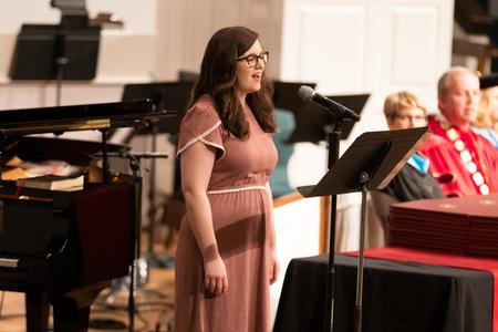Kaylen Williams, music education major, performs Give Me Jesus during summer commencement services. - Photo by Kristi McMurry Woody