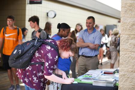 Students visit tables at the Study Abroad Fair. - Photo by Kristi McMurry Woody