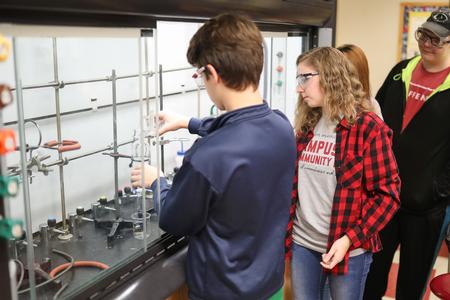 Abby Mausy, pre professional studies major, leads a chemistry seminar for area high school students during Campus and Community Day.  - Photo by Kristi McMurry Woody