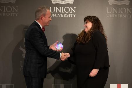 Glynis Blackard receives the Distinguished Achievement Award in healthcare during homecoming. - Photo by Kristi McMurry Woody