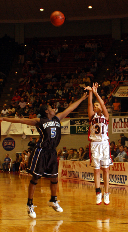 Freshman guard Merideth Richardson (31) shoots a three pointer during Union win in the title game of the NAIA National Tournament. - Photo by Morris Abernathy