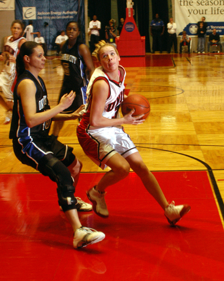 Freshman guard Crystal Eason drives into the lane against the Oklahoma City defense for a shot during Union win in the title game of the NAIA National Tournament. - Photo by Morris Abernathy