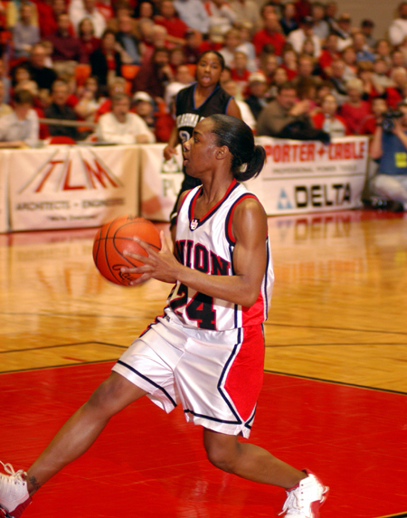 Monica Elliot drives in all alone for a layup during Union's 67-63 win over Oklahoma City in the NAIA National Tournament. - Photo by Morris Abernathy