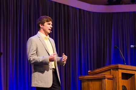 Stephen Neu, coordinator for service and mobilization, speaks in chapel. - Photo by Jess Newendyke