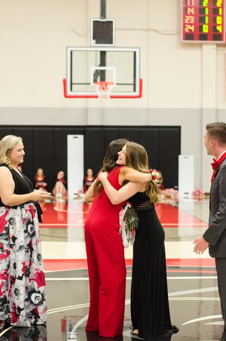 Susie Oliver, first lady of the university, congratulates Gabby Morocco, psychology major, on being named Miss Union for Homecoming 2019.  - Photo by Jess Newendyke