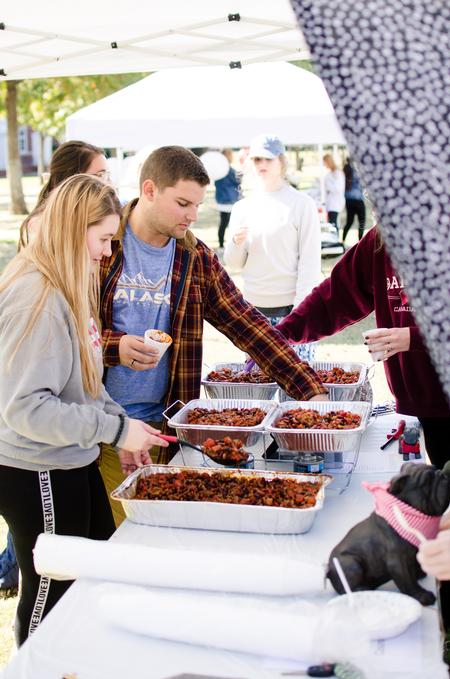 Students enjoy the Homecoming chili cook-off. - Photo by Jess Newendyke
