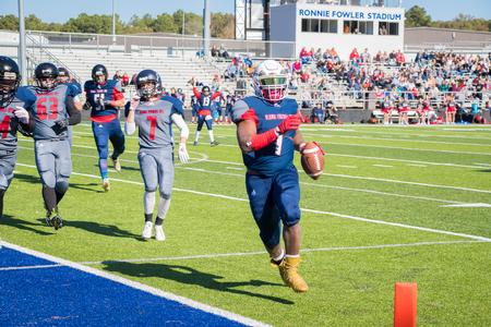 Alumni of Union University play in the Buster Bowl during Homecoming. - Photo by Nikki Grim