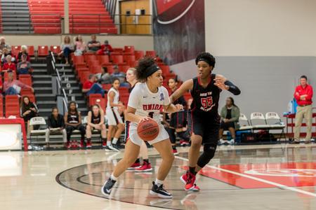 Sadie Knee dribbles during the Homecoming game against Martin Methodist. - Photo by Nikki Grim