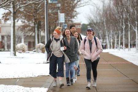 Students walk to class after a winter snow on campus. - Photo by Kristi McMurry Woody