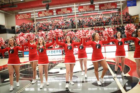 Cheerleaders pump up the crowd during a game against Lee University.  - Photo by Kristi McMurry Woody