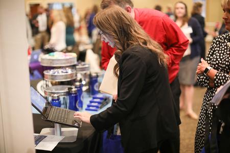 Students talk with recruiters during the Education Expo hosted by the Vocatio Center for Life Calling and Career. - Photo by Kristi McMurry Woody
