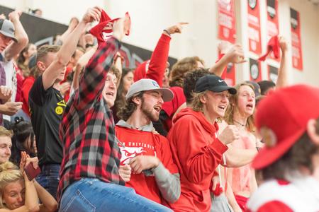 Students cheer for the Bulldogs during a basketball game. - Photo by Nikki Grim