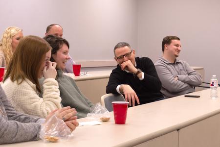 Members of the history department gather for a Phi Alpha Theta history honor society meeting.  - Photo by Naomi Mengel