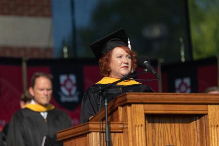 Jinni Leigh Blalack, associate professor of psychology, reads from Psalm 121 at the beginning of Spring Commencement. - Photo by Kristi McMurry Woody