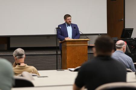Ray Van Neste, dean of the school of theology and missions, introduces Eric Smith for his lecture in Harvey Auditorium. - Photo by Kristi McMurry Woody