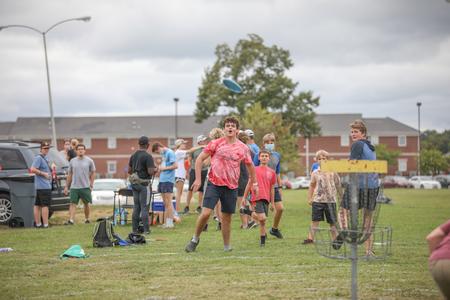Families enjoy some disc golf during Family Weekend. - Photo by Kristi McMurry Woody