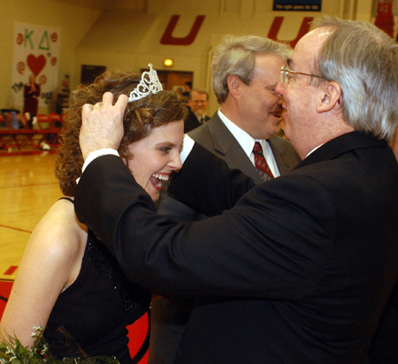 Union University president David S. Dockery crowns senior Lauren Oldham as 2005 Homecoming queen during halftime of the women's basketball game Feb. 19. - Photo by Morris Abernathy