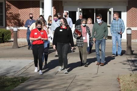 Student ambassadors lead a group of prospective students on a tour of campus during Day at the U. - Photo by Sarah Palmer Goff