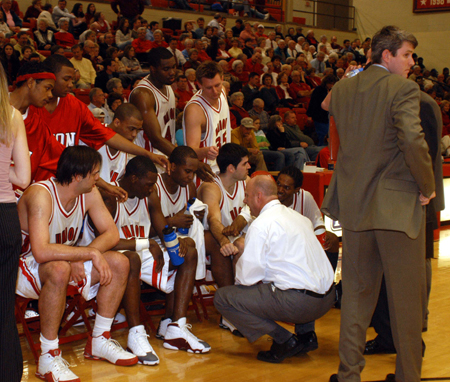 Union head coach Ralph Turner gives his players instructions during a timeout in Union 78-75 win over Mountain State. - Photo by Morris Abernathy
