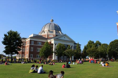 Students and community members participate in a Call for Justice on the Great Lawn. - Photo by Abigail Aspinwall