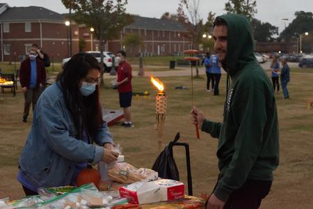 Students enjoy a cookout on the lawn of the Bowld Student Commons. - Photo by Naomi Mengel