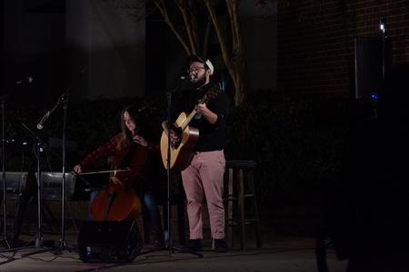 Students perform during Open Mic Night outside of Barefoots Joe. - Photo by Naomi Mengel