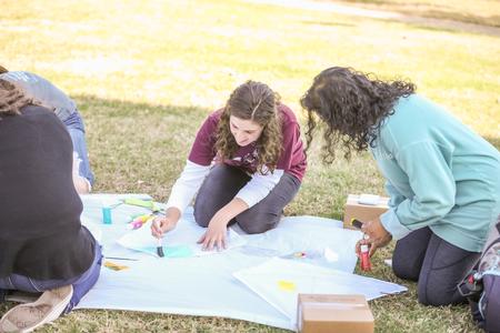 Students decorate kites during the Student Activities Council kite flying event. - Photo by Kristi McMurry Woody