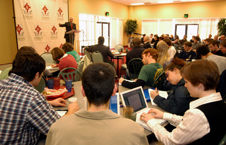 Author and theologian Millard Erickson lectured in conjunction with the Scholar-in-Residence Program this spring.  Here he presented his lecture  entitled "Can Theology Learn Anything from History?" to a roomful. - Photo by Morris Abernathy