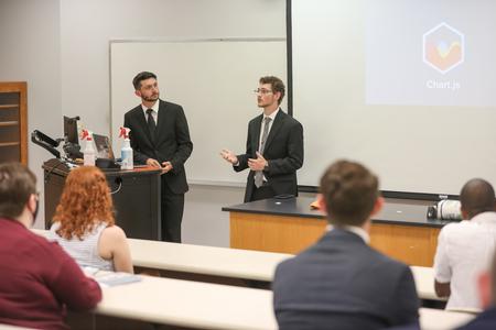 Christopher Griffin and Hunter Walker give their computer science presentation during the Scholarship Symposium. - Photo by Kristi McMurry Woody
