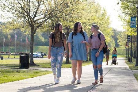 Students enjoy a nice day on campus. - Photo by Naomi Mengel
