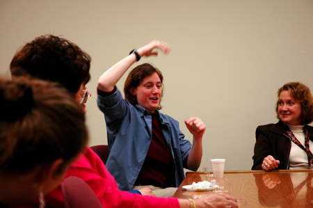 Alum Christina Jones enjoys fellowship with Jinni Leigh Blalack and other fellow graduates during Homecoming at an alumni gathering in the sociology department. - Photo by Lauren Crane