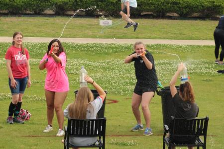 Students participate in games during Res Life's Field Day event.  - Photo by Abigail Aspinwall