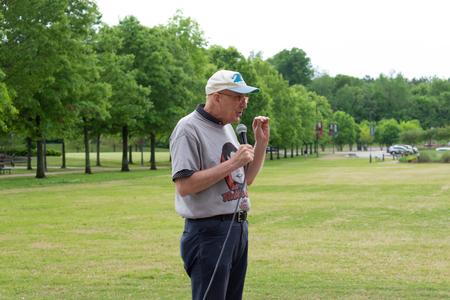 Steve Beverly makes announcements at the start of the Stomp Out Stigma 5K. - Photo by Naomi Mengel