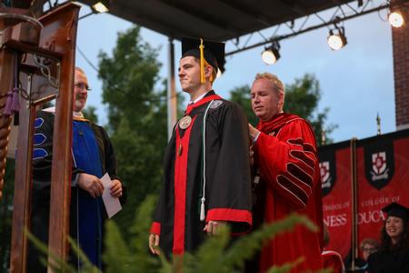 5/15/21 - Jonathan Van Neste, physics graduate, receives the 110th Tigrett Medal at the end of spring commencement. - Kristi McMurry Woody