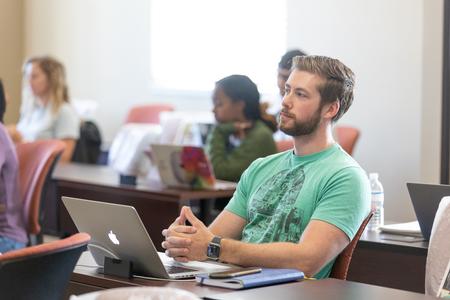 Students on the Hendersonville campus take notes and listen in class. - Photo by Kristi McMurry Woody