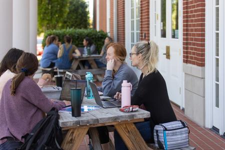 Students study outside on the Hendersonville campus. - Photo by Kristi McMurry Woody
