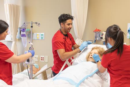 Nursing students work on a simulation at the Hendersonville campus. - Photo by Kristi McMurry Woody
