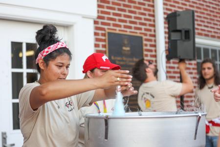 Members of the Student Activities Council make cotton candy during Welcome Week's SAC Fest. - Photo by Kristi McMurry Woody