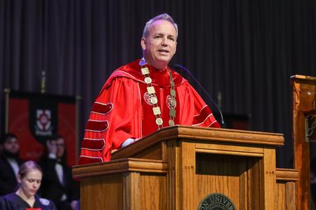 Dub Oliver, president of the university, speaks in Convocation.  - Photo by Kristi McMurry Woody