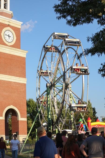 Union friends and family ride the ferris wheel on the Great Lawn for Union Night.  - Photo by Kristi McMurry Woody