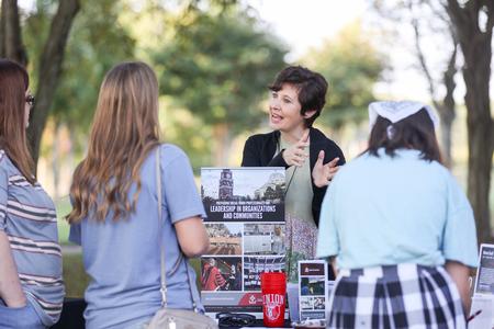10/8/21 - Tammy Patton, associate professor of social work, chats with prospective students during Day at the U. - Kristi McMurry Woody