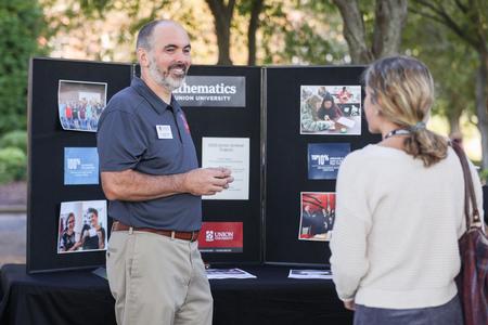 10/8/21 - George Moss, associate professor of mathematics and department chair, talks with prospective students during Day at the U. - Kristi McMurry Woody