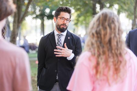 Jacob Shatzer, associate dean for the school of theology and missions, talks with prospective students and their families during Day at the U. - Photo by Kristi McMurry Woody