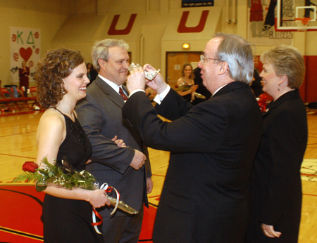 President David S. Dockery crowns Senior Lauren Oldham as 2005 Homecoming queen. Lauren is the daughter of Roger (her escort) and Debbie Oldham and is planning a career in non-profit administration. 
 - Photo by Morris Abernathy