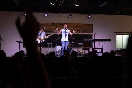Students perform in Open Mic Night. - Photo by Cade Smith