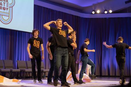 Members of Blank Slate Improv make their big entrance to their show in the chapel. - Photo by Cade Smith