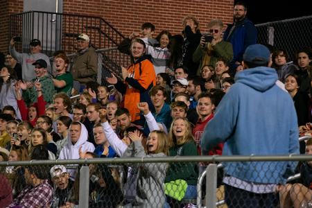 Students cheer at a soccer game against Delta State during Community Night. - Photo by Faith Orr