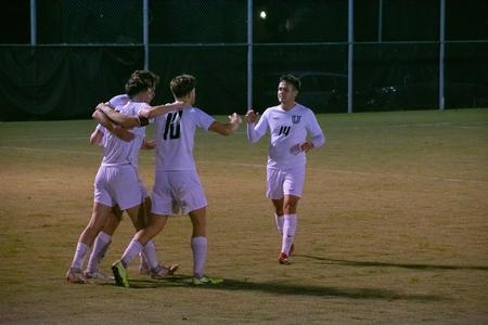 Soccer players celebrate a goal in their game against Delta State. - Photo by Faith Orr