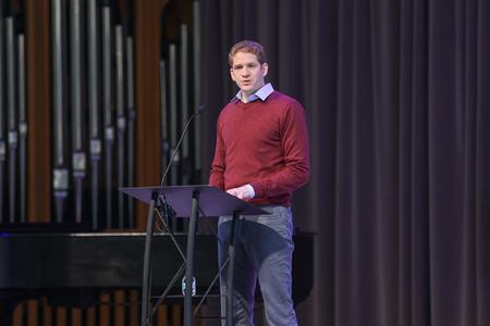 Jeremy Blaschke, associate professor of biology and faculty member of the year, speaks in chapel. - Photo by Kristi McMurry Woody